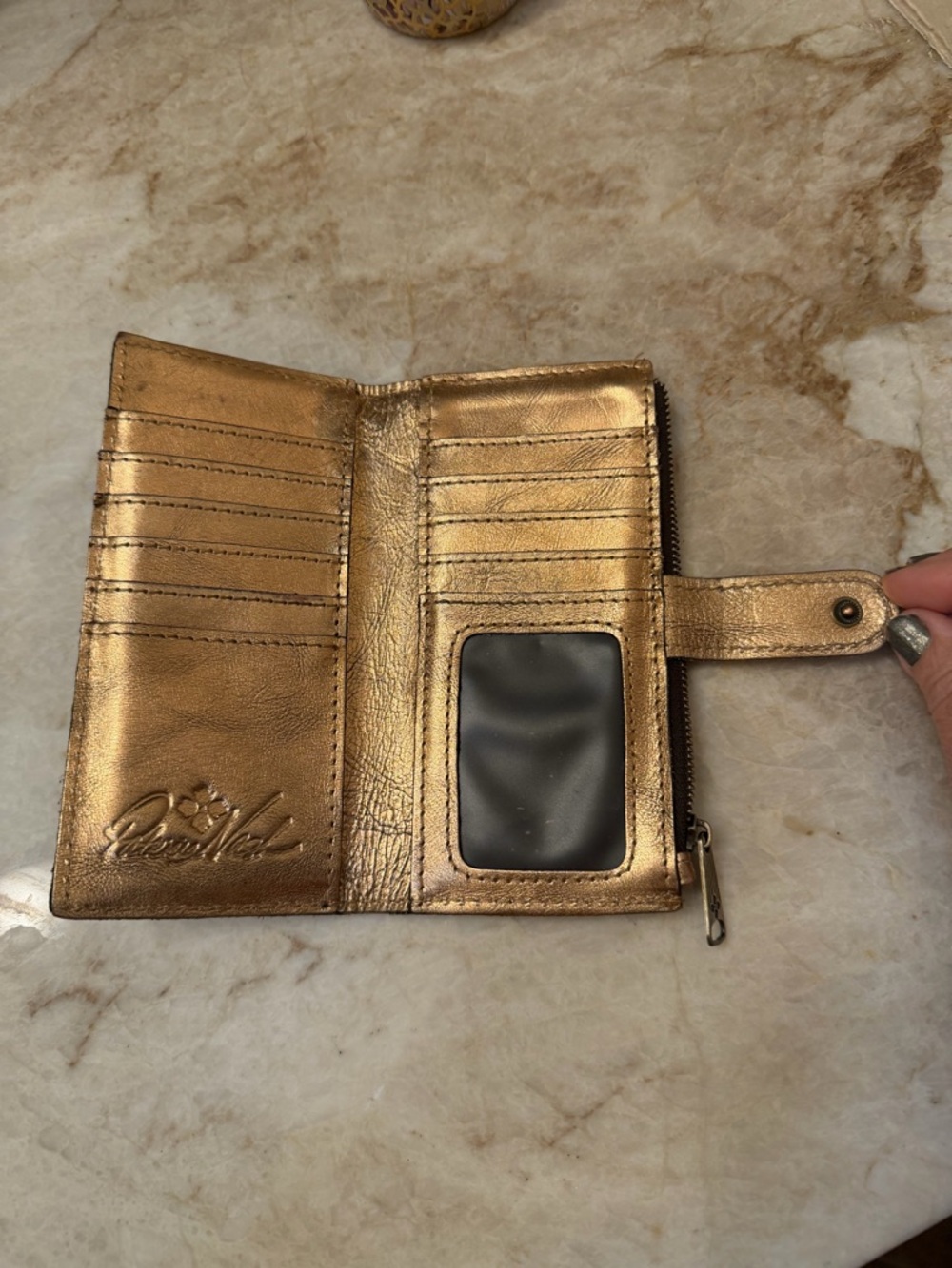 Patricia Nash slim metallic bifold
Wallet - Picture 10 of 10